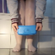 A girl takes a long, curling shit into a plastic container with the words, "C.P." inscribed on it. Perhaps the initials of a fan who will receive the turd? Over 2 minutes.